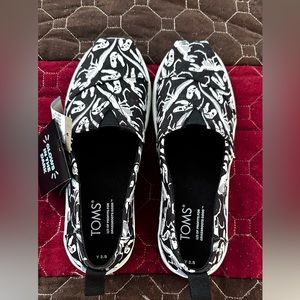 Kids Toms glow in the dark dinosaur Alpargata’s